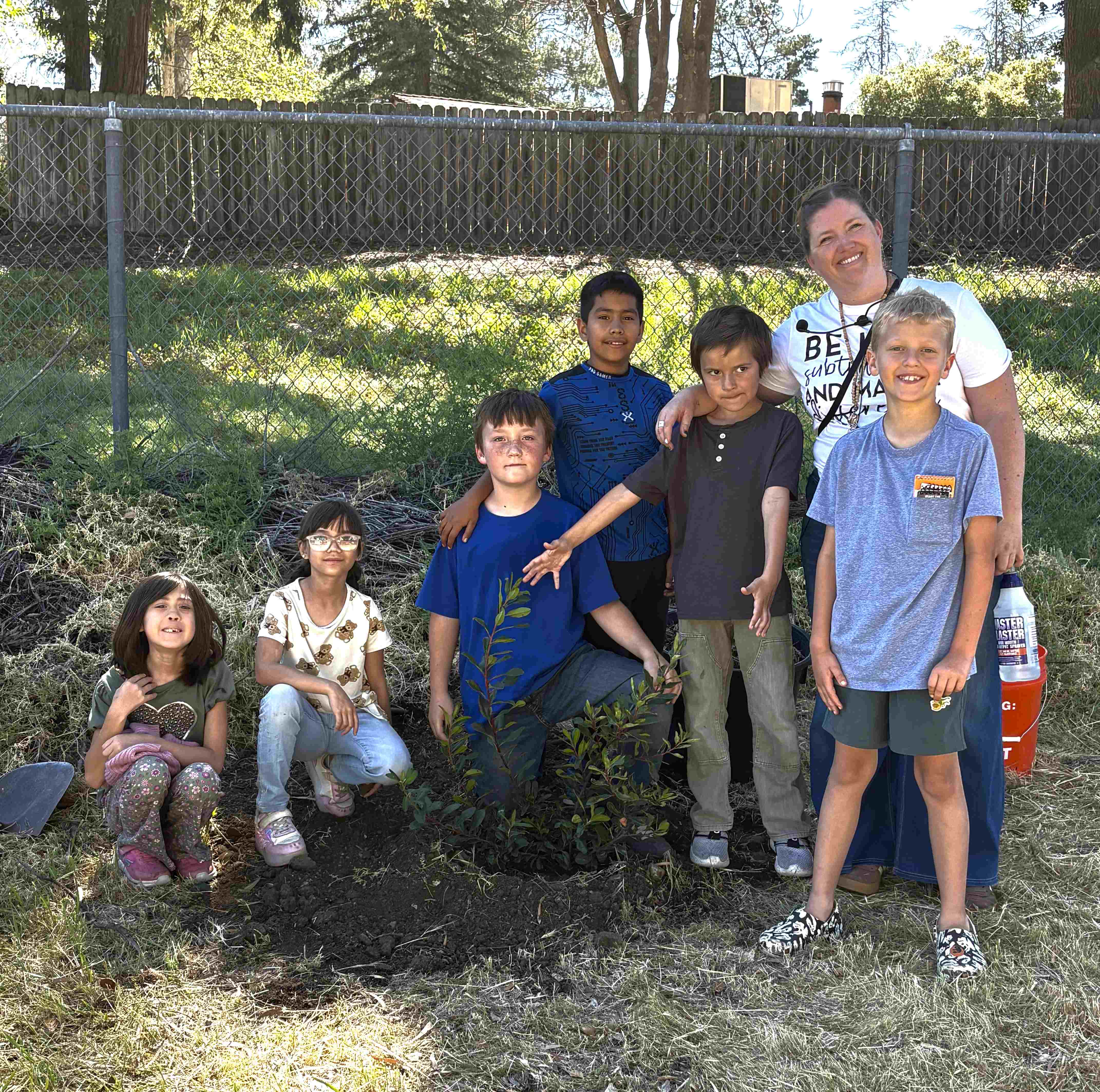 Happy students after helping to plant a Toyon!
